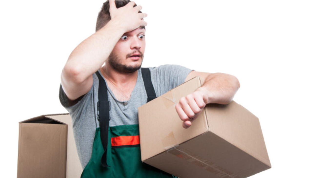 Mover,Guy,Holding,Cardboard,Gesturing,Being,Late,Looking,On,Wrist